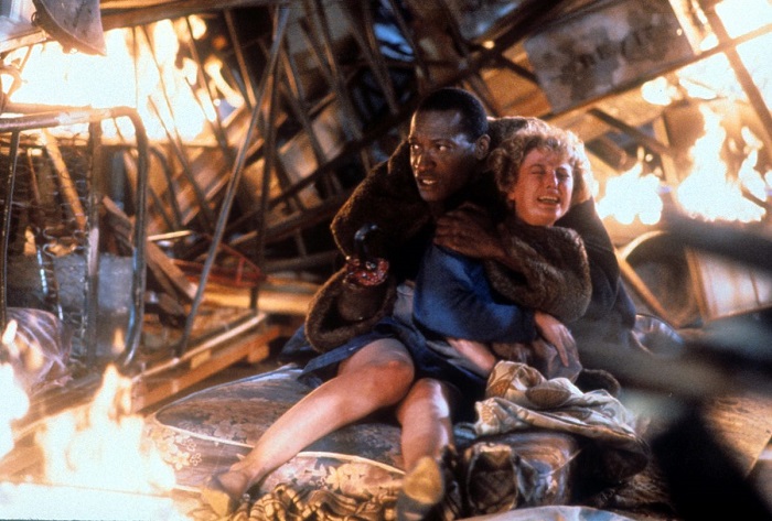 Tony-Todd-holds-onto-Virginia-Madsen-in-a-scene-from-the-film-Candyman-1992-1200x811